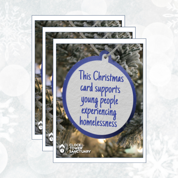 A 3-pack of Christmas cards, on which a paper bauble reads 'This Christmas card supports young people experiencing homelessness'